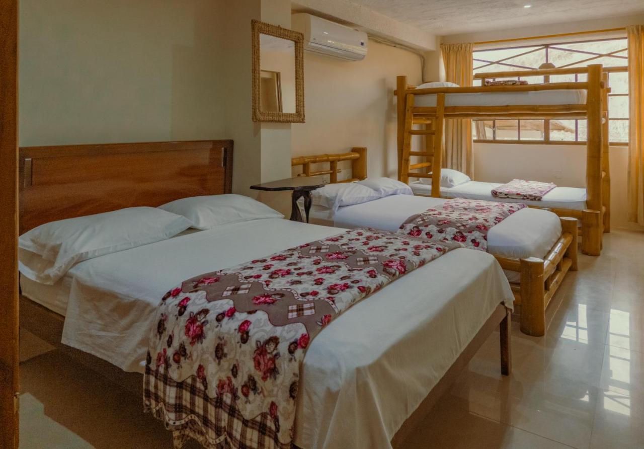 Hostal Poseidon Пуэрто-Кайо Экстерьер фото