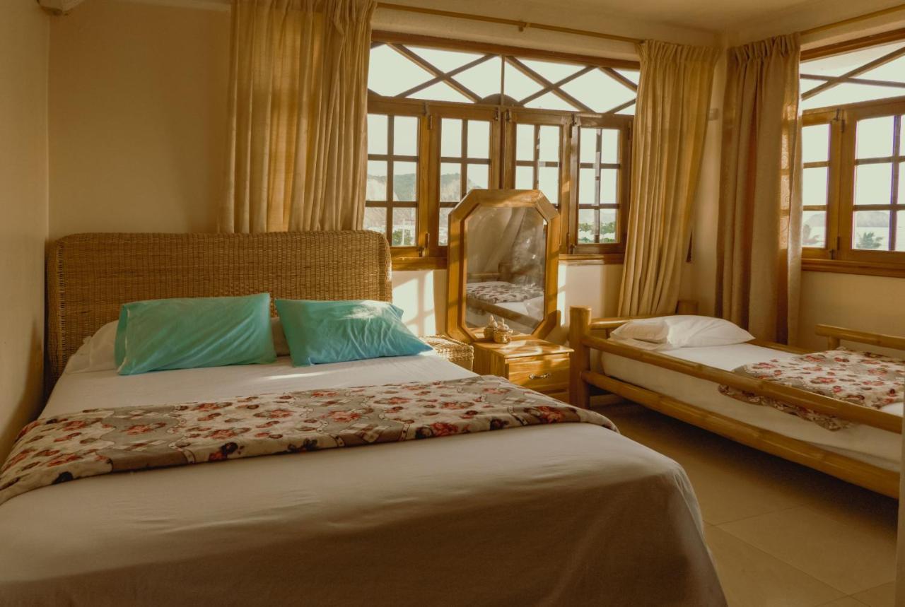 Hostal Poseidon Пуэрто-Кайо Экстерьер фото