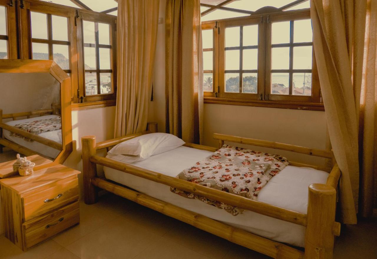 Hostal Poseidon Пуэрто-Кайо Экстерьер фото