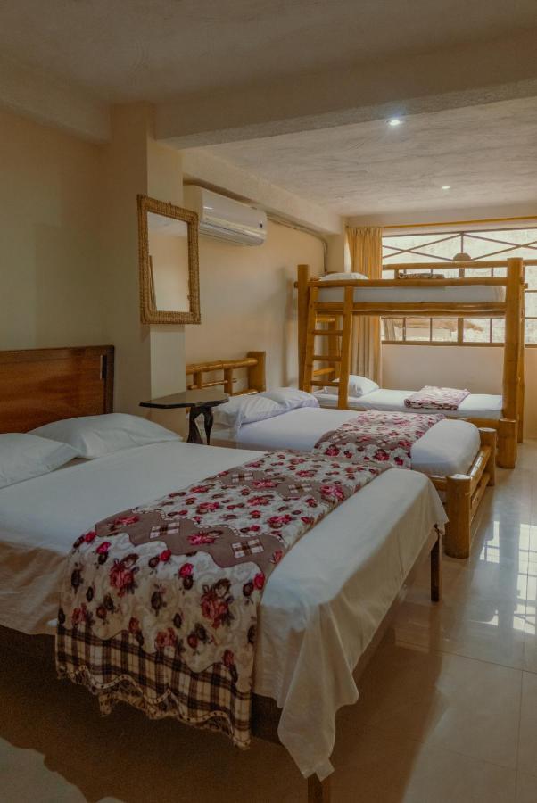 Hostal Poseidon Пуэрто-Кайо Экстерьер фото