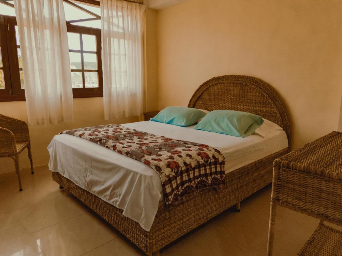 Hostal Poseidon Пуэрто-Кайо Экстерьер фото